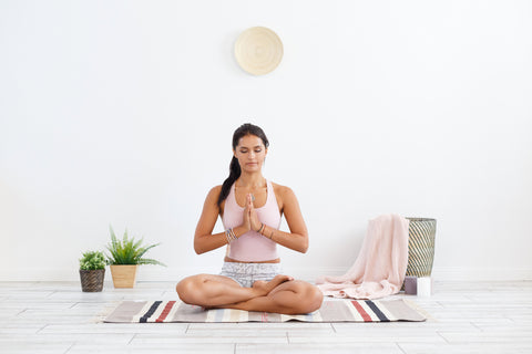 Yogini in Half Lotus Pose